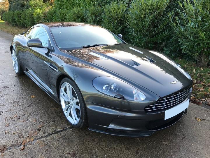 An Aston Martin DBS parked, ready for an event or special occasion hire.