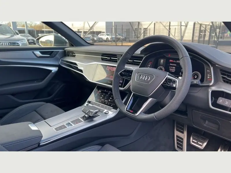 Side profile of the Audi A5, highlighting its sleek lines for renting.