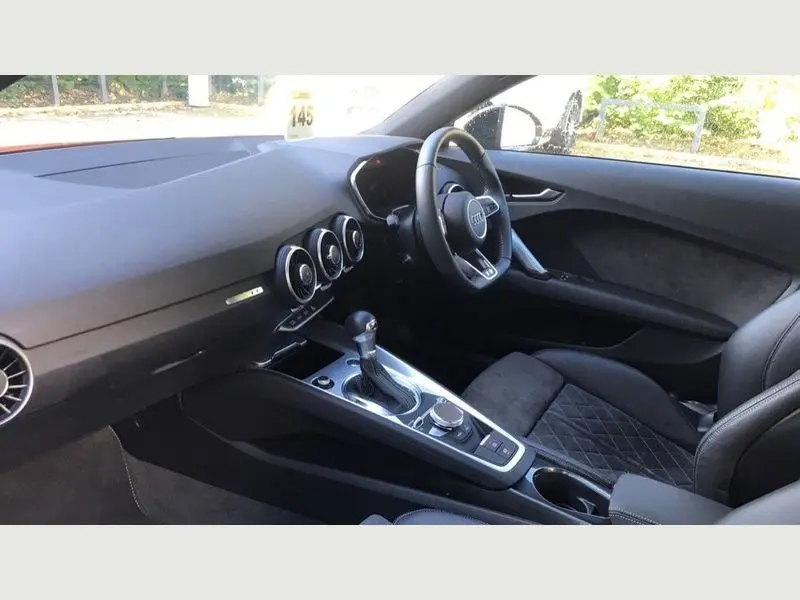 Close-up of the front of an Audi TT available for sports car hire.