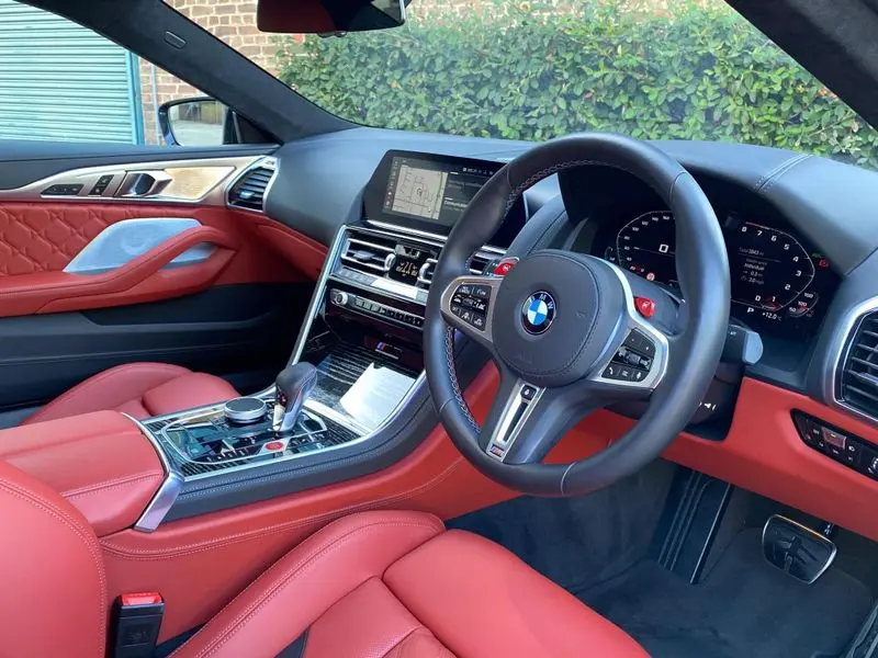 Action shot of a BMW M8 Series available for hiring.