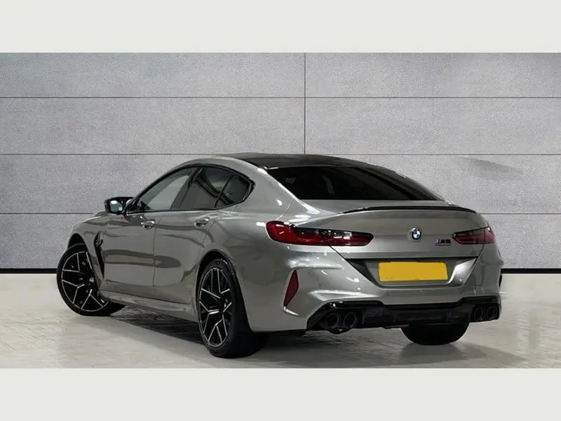 Close-up on the front grille of a BMW M8 Series for rental.