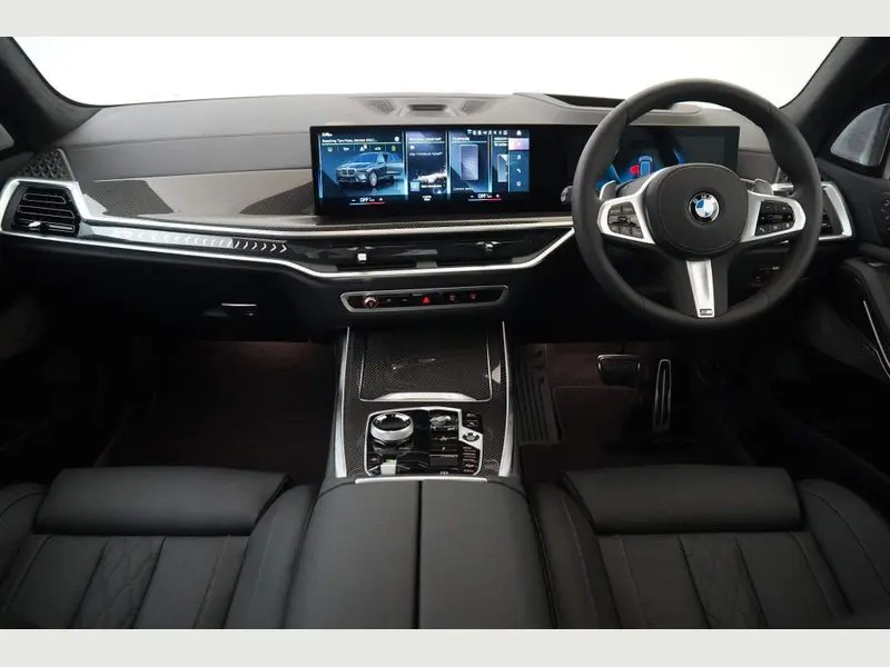 Side profile of a sleek black BMW X7