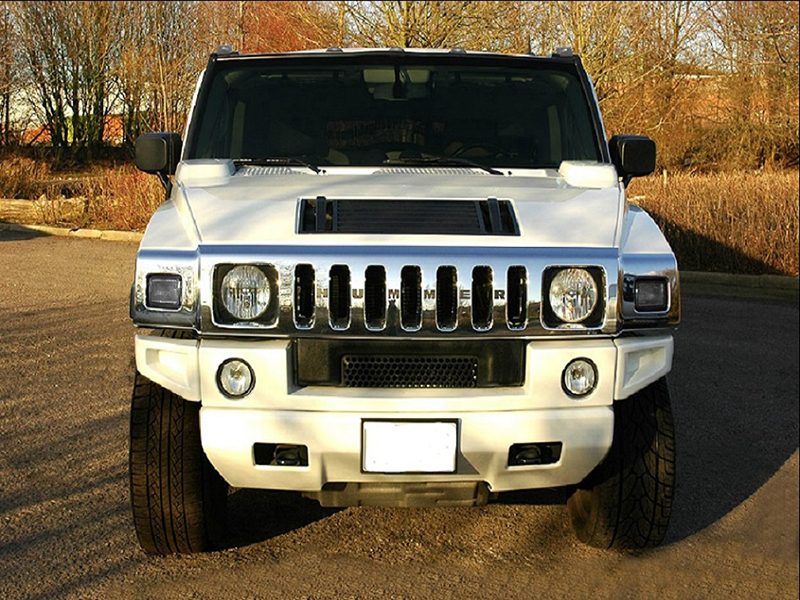 A fleet of imposing H2 Hummer limousines perfect for a stag do.