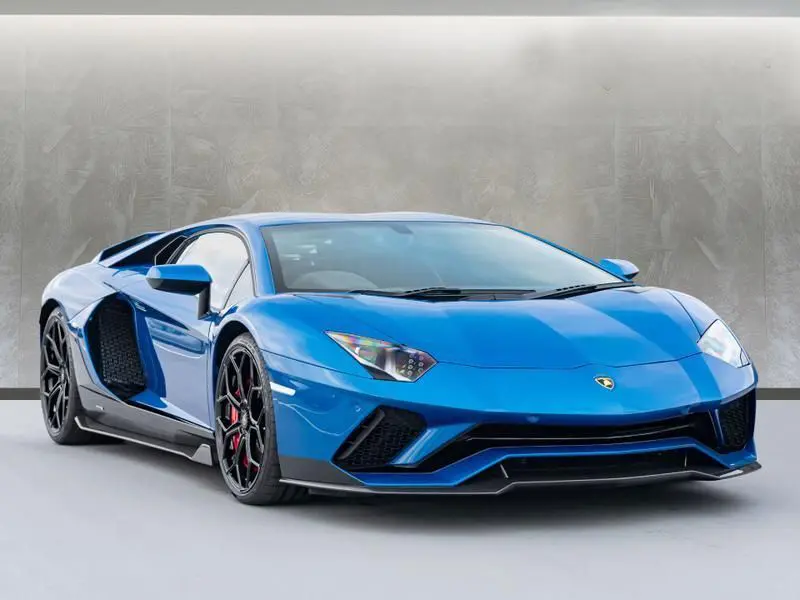 A sleek, black Lamborghini Aventador ready for a film scene.