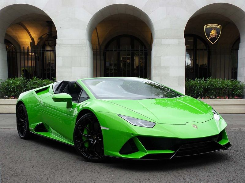 A green Lamborghini Huracan used in a music video production.