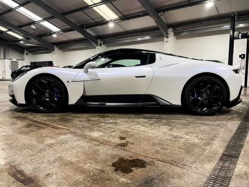 Side profile of the sleek Maserati MC20 for hire.