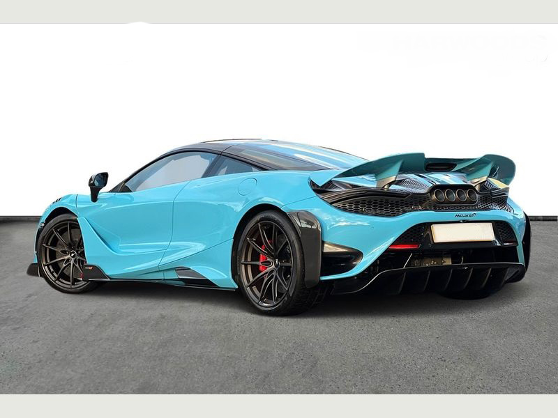 A sleek grey Mclaren 765LT parked, showcasing its sporty design for self-drive hire.