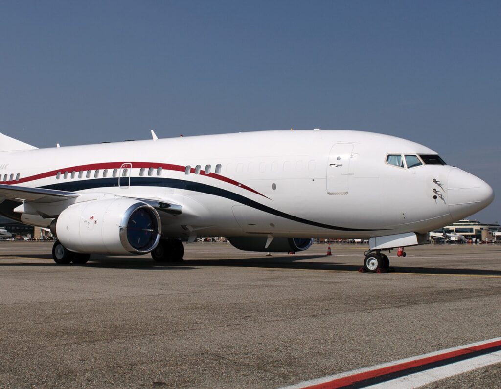 Corporate team inside a spacious Boeing Business Jet cabin
